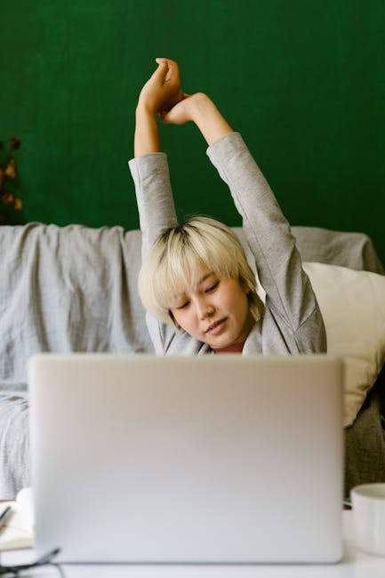 Colombian person stretching at home workspace