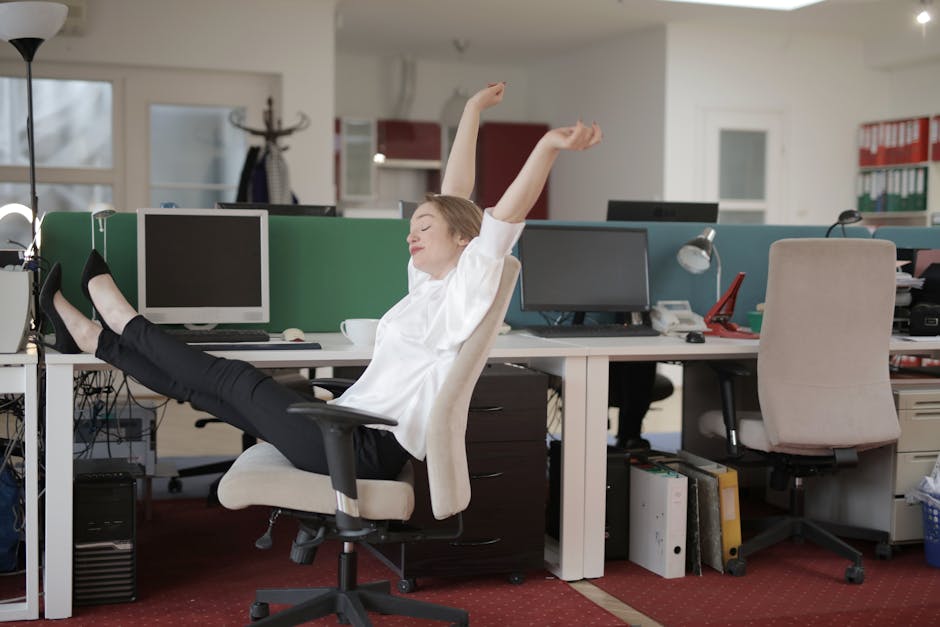 Colombian professionals doing stretching exercises in modern office